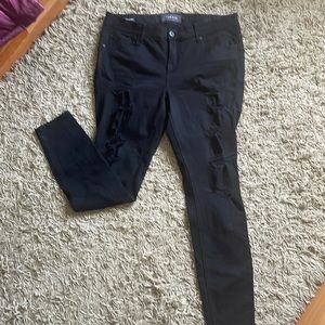 Distressed skinny jeans